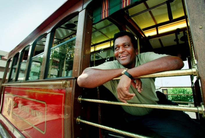 Charley Pride tries out a seat on the MTA trolley car named for him June 15, 1999. The car, with &quot;The Pride of Country Music&quot; emblazoned on the side, was dedicated during Pride&#39;s annual Fan Fair breakfast.