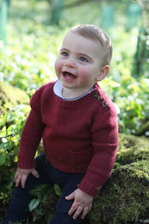 The one-year-old Prince Louis seems to have been happily rolling in moss - Credit: Duchess of Cambridge