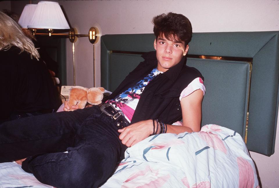 Ricky Martin of Menudo in a hotel room in Los Angeles while on tour in 1988. (Photo: Brenda Chase/Online USA, Inc.)
