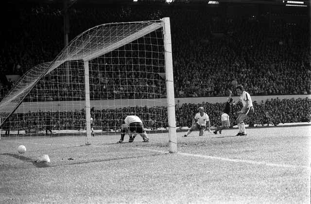 Kenny Dalglish, second right, turns away after scoring Scotland's winner at Hampden Park