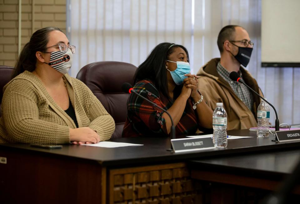 District 186 School board members Sarah Blissett, left, Erica Austin, center, and Micah Miller, right, listen as Springfield NAACP president Teresa Haley calls for wands and metal detectors in the schools during a special meeting of the Springfield School District No. 186 Board of Education at the District 186 Headquarters in Springfield, Ill., Monday, November 22, 2021. [Justin L. Fowler/The State Journal-Register]