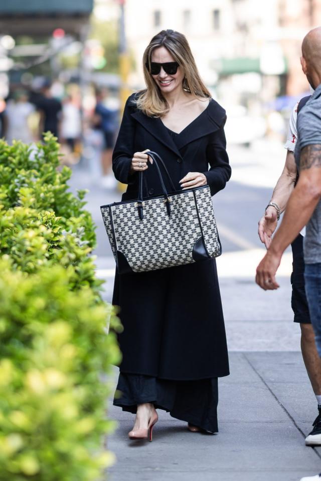 Angelina Jolie Wears the Big Bag Trend While at the D.C. Airport