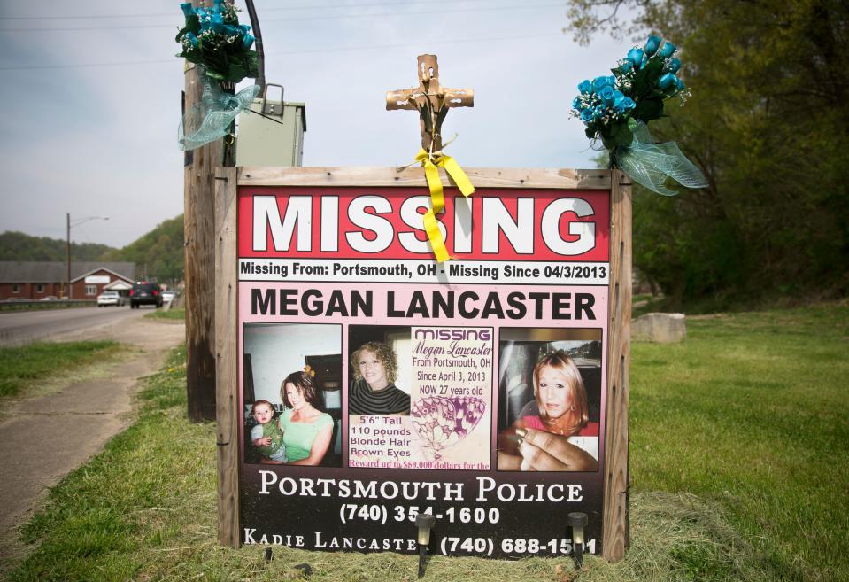 Megan Lancaster went missing in Portsmouth, Ohio in April of 2013. She's never been found. She battled addiction and was an admitted prostitute. Signs like this one in New Boston remind the community of the missing woman.