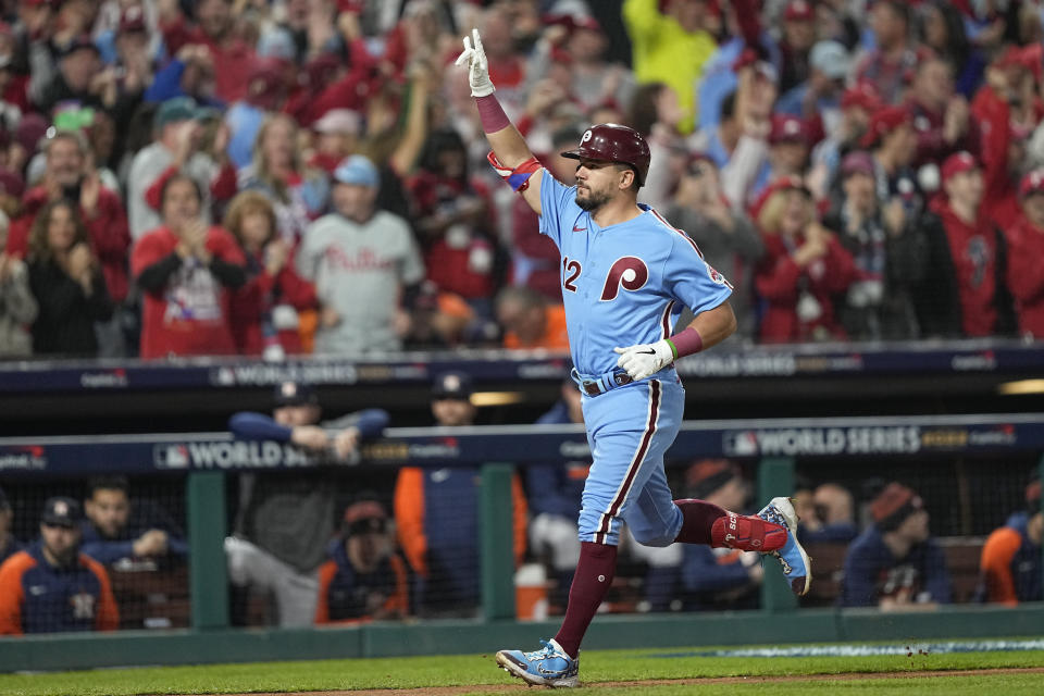 Philadelphia Phillies' Kyle Schwarber celebrates his home run during the first inning in Game 5 of baseball's World Series between the Houston Astros and the Philadelphia Phillies on Thursday, Nov. 3, 2022, in Philadelphia.(AP Photo/David J. Phillip)