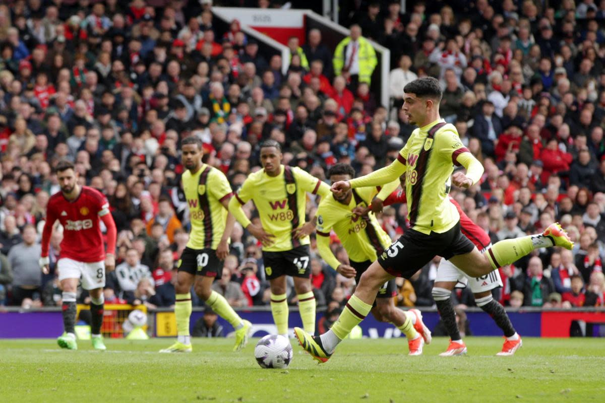 Zeki Amdouni slots home a penalty at Old Trafford <i>(Image: PA)</i>