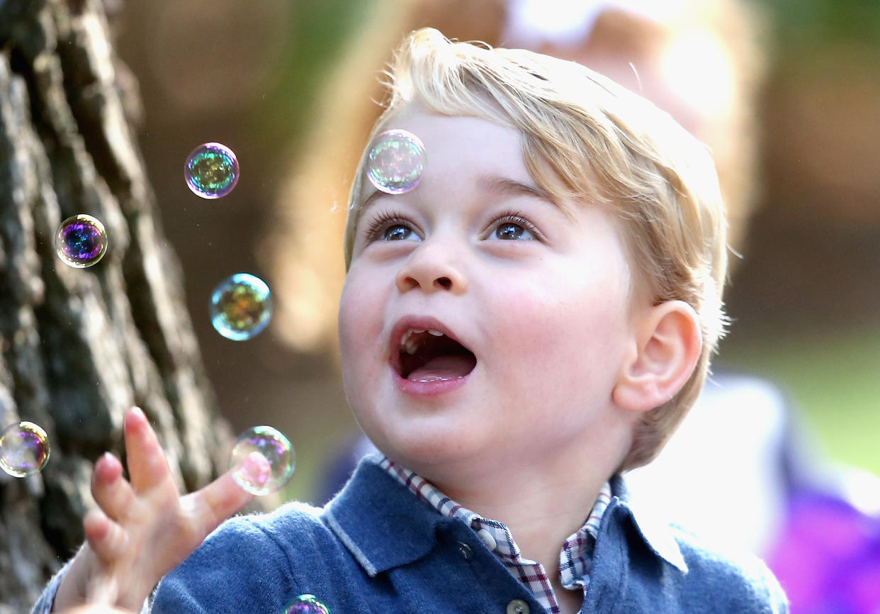 VICTORIA, BC - SEPTEMBER 29:  Prince George of Cambridge plays with bubbles at a children's party for Military families during the Royal Tour of Canada on September 29, 2016 in Victoria, Canada. Prince William, Duke of Cambridge, Catherine, Duchess of Cambridge, Prince George and Princess Charlotte are visiting Canada as part of an eight day visit to the country taking in areas such as Bella Bella, Whitehorse and Kelowna  (Photo by Chris Jackson - Pool/Getty Images)