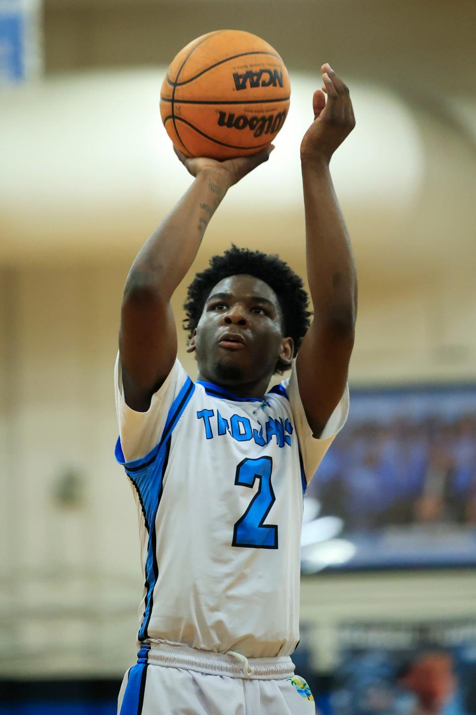 Ribault's George Woods (2) shoots a free throw during the second quarter of the 2022-2023 Gateway Conference boys high school basketball tournament final Friday, Jan. 27, 2023 at Jean Ribault High School in Jacksonville, Fla. The Ribault Trojans defeated the Andrew Jackson Tigers 60-55 in overtime. 