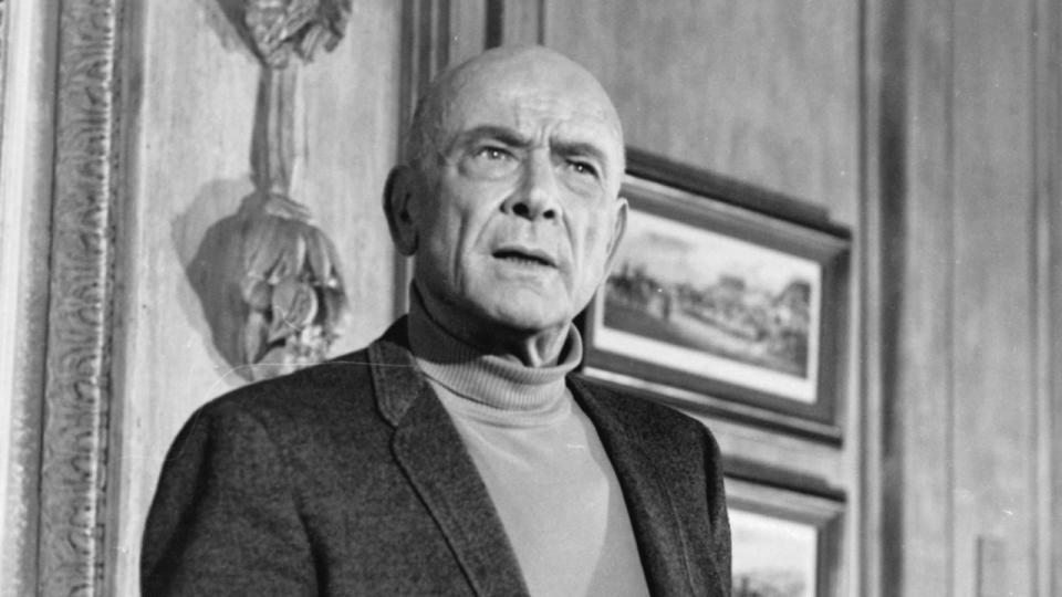 Actor Dean Jagger poses for a portrait on the set of 