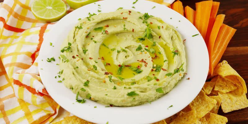 <p>It's like the best of hummus and guacamole combined. </p><p>Get the <a href="https://www.delish.com/uk/cooking/recipes/a29947652/avocado-hummus-recipe/" rel="nofollow noopener" target="_blank" data-ylk="slk:Avocado Hummus;elm:context_link;itc:0;sec:content-canvas" class="link ">Avocado Hummus</a> recipe.</p>