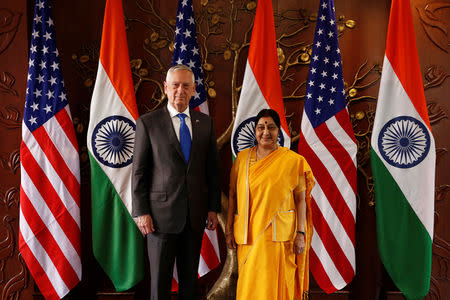 U.S. Secretary of Defence James Mattis poses beside India’s Foreign Minister Sushma Swaraj before the start of their meeting in New Delhi, September 6, 2018. REUTERS/Adnan Abidi