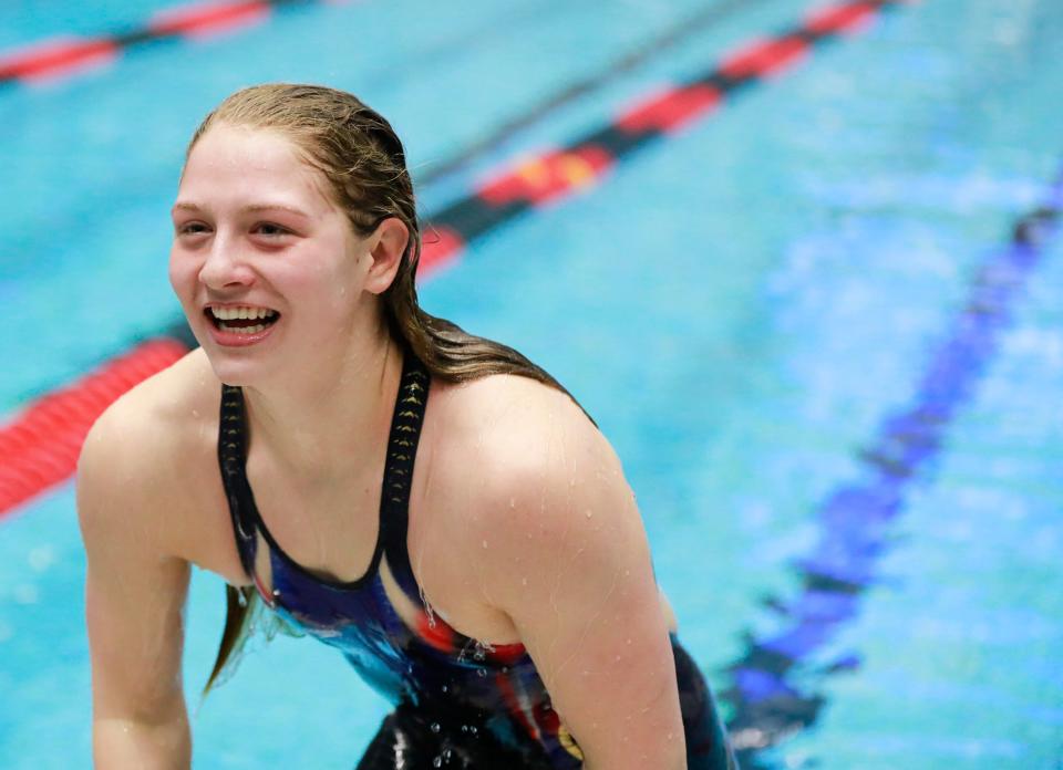 Jeremy Hogan | Herald-Times York's Emily Weiss breaking the national record while competing in the 100 breast stroke the IHSAA state swim meet, Saturday, February 10, 2018 in Indianapolis, Ind.