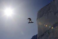 FILE - Shaun White of the United States takes a jump during a snowboard slopestyle training session at the Rosa Khutor Extreme Park, prior to the 2014 Winter Olympics, Feb. 4, 2014, in Krasnaya Polyana, Russia. The Beijing Olympics will be the fifth Olympics for the three-time gold medalist. And the last Olympics for the 35-year-old — get this — elder-statesman who is now more than double the age of some of the riders he goes against. (AP Photo/Andy Wong File)