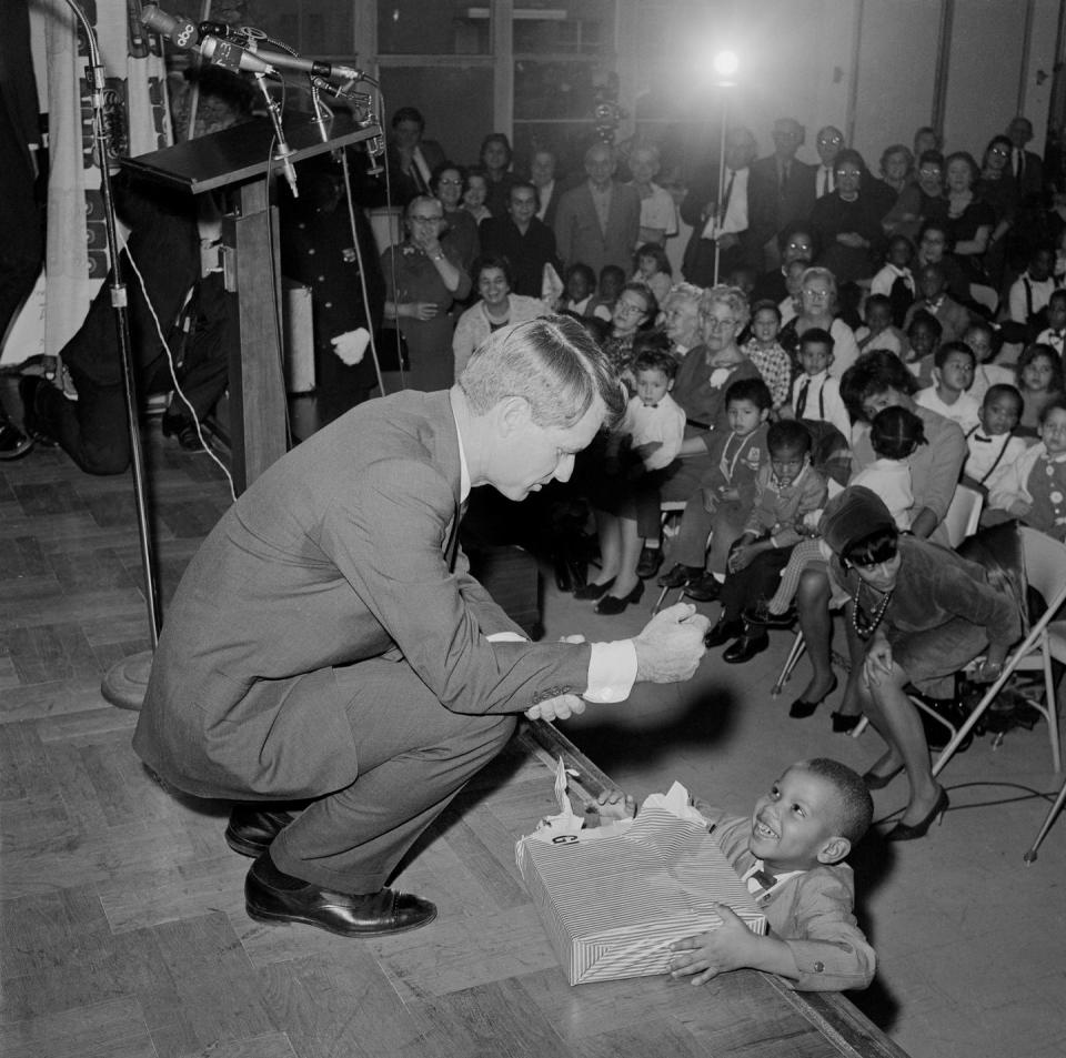 1965: Robert Fitzgerald Kennedy plays Santa in New York City