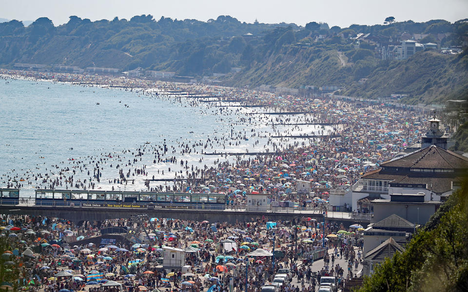 The scene on the beach in Bournemouth, Dorset, after the UK officially recorded its warmest day of the year so far when the temperature reached 32.6C (90.7F) at London's Heathrow Airport at 2.46pm.. Picture date: Wednesday June 24, 2020. See PA story WEATHER Hot. Photo credit should read: Andrew Matthews/PA Wire