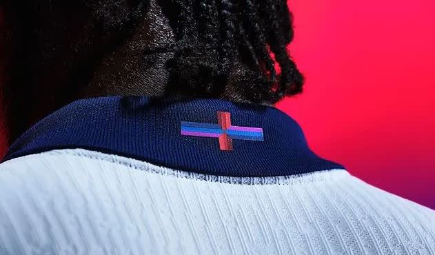 Nike has embroidered a multicoloured cross on the collar of the new England football kit to replace the St George cross of the national flag. (Nike/X)