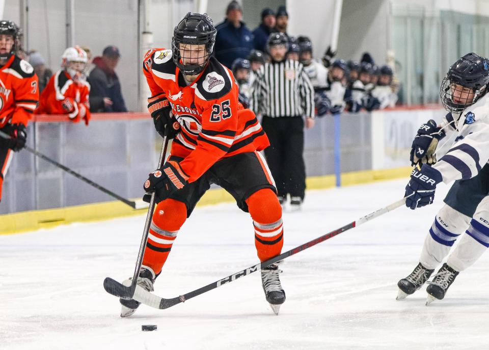Middleboro's Sam Steinman handles the puck during a game against Sandwich at Gallo Ice Arena in Bourne on Wednesday, Feb. 7, 2024.