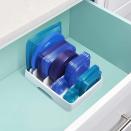 <p>Prevent your drawers from overflowing with container lids, and get this <span>YouCopia StoraLid Food Container Lid Organizer</span> ($20). It comes in five different handy sizes to fit lids big and small. Simply add the dividers as needed to best suit your needs. </p>