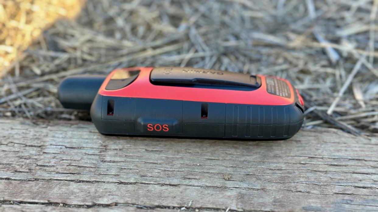  A side view of the Garmin GPSMAP 67i showing the SOS button cover. 