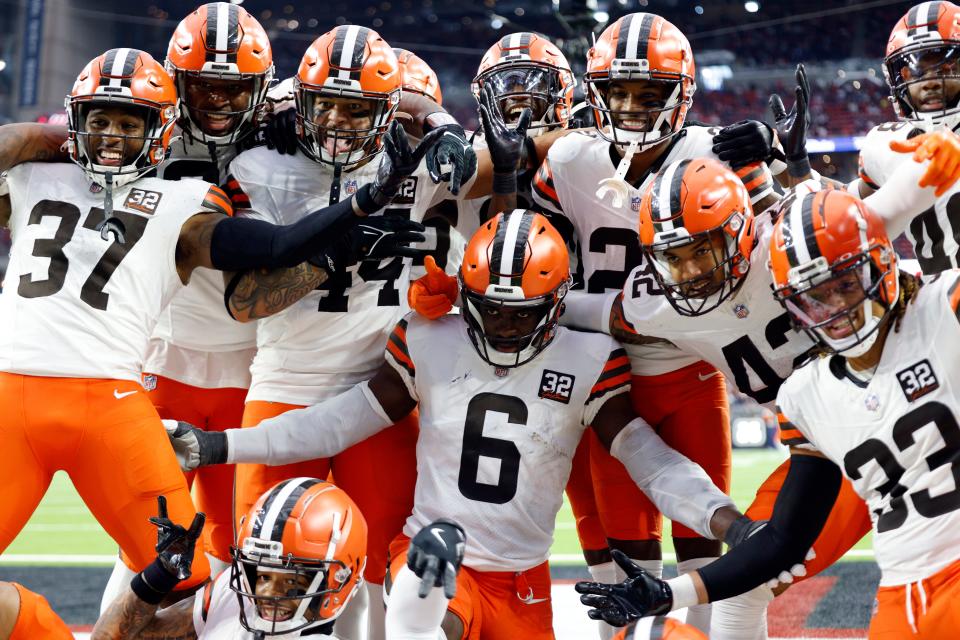 HOUSTON, TEXAS - DECEMBER 24: Jeremiah Owusu-Koramoah #6 of the Cleveland Browns celebrates an interception with his teammates during the second quarter against the Houston Texans at NRG Stadium on December 24, 2023 in Houston, Texas. (Photo by Tim Warner/Getty Images)