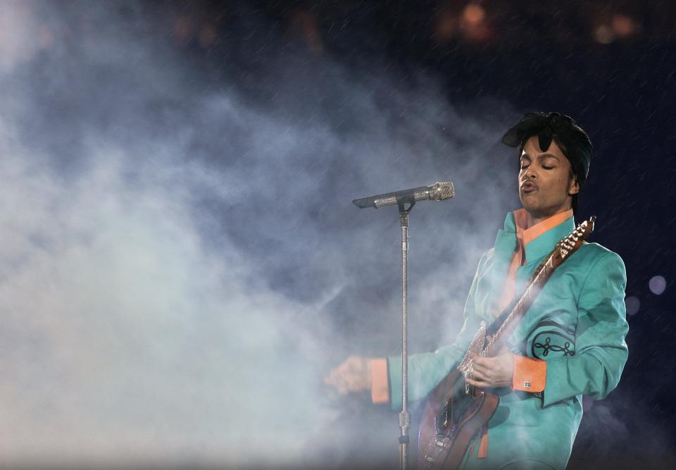 Prince performs in 2007 during half-time at the Super Bowl.