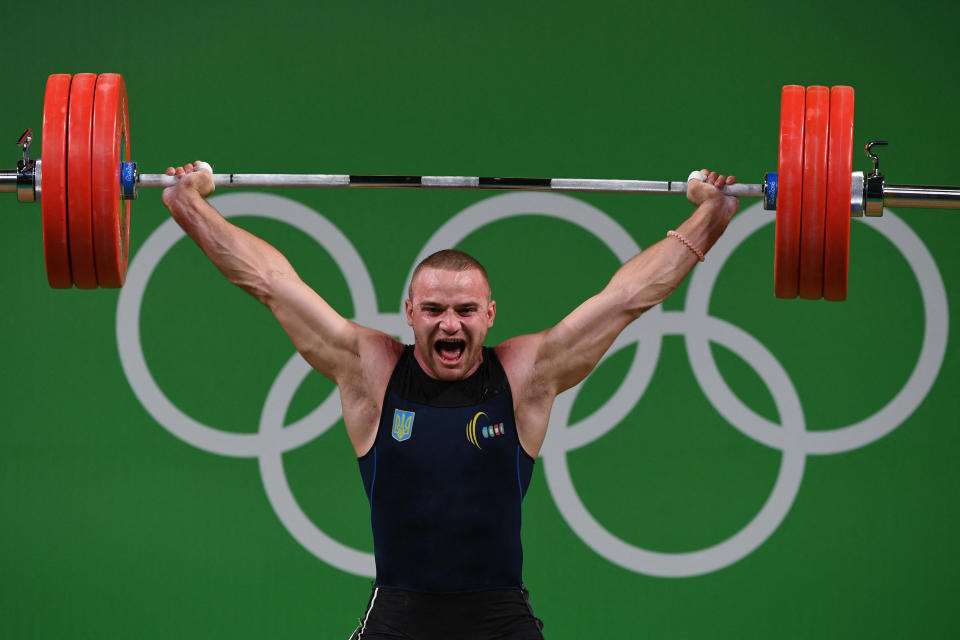 Ukraine's Oleksandr Pielieshenko competes during the men's weightlifting 85kg event during the Rio 2016 Olympics Games in Rio de Janeiro, in an Aug. 12, 2016 file photo. / Credit: GOH CHAI HIN/AFP/Getty