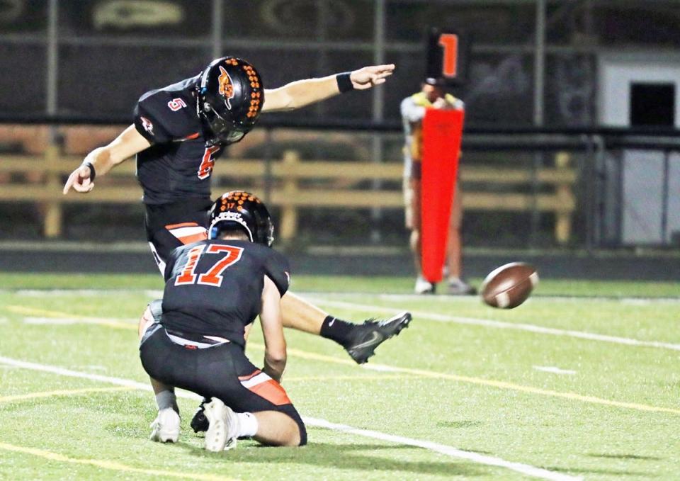 Mediapolis’ Drew Miller kicks an extra point in second half action of the playoff game against Central Decatur. Miller is comitted to punt for the national champion Georgia Bulldogs after graduation.