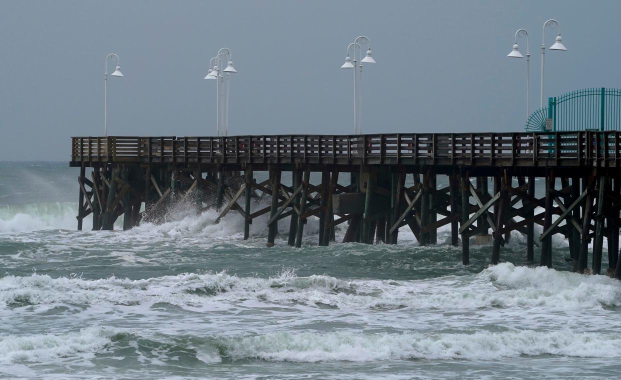 Surf hits the Main Street Pier in Daytona Beach as the effects of Hurricane Idalia reached Daytona Beach.