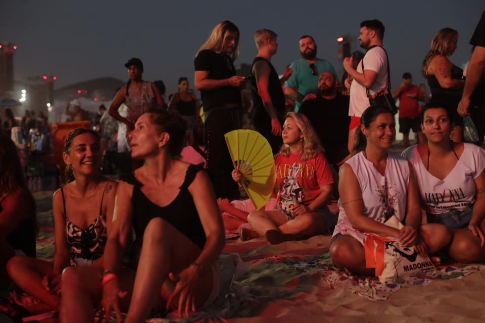 Fans wait for the start of Madonna's last show of her The Celebration Tour, on Copacabana beach in Rio de Janeiro, Brazil, Saturday, May 4, 2024. (AP Photo/Bruna Prado)