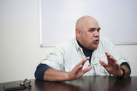 Jesus Torrealba, secretary of the Venezuelan coalition of opposition parties (MUD), gestures during an interview with Reuters in Caracas November 23, 2015. REUTERS/Marco Bello