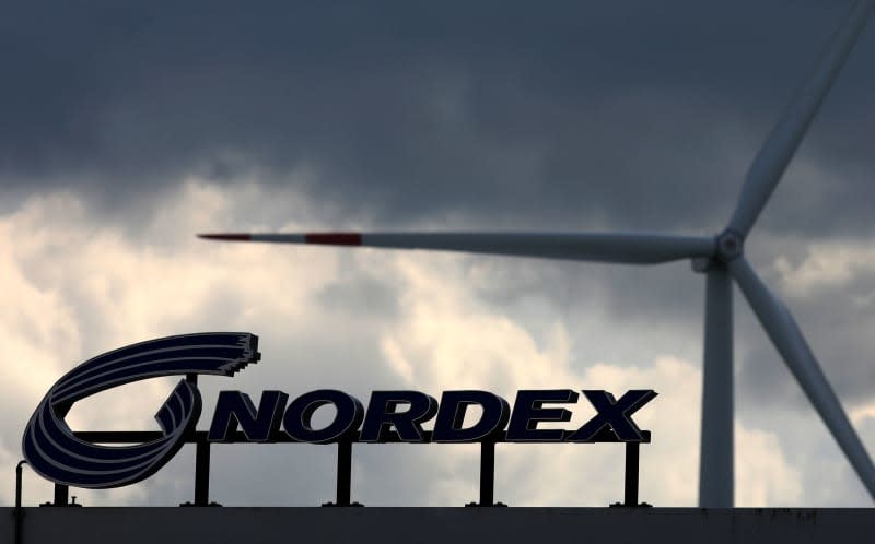 Dark clouds are gathering over the rotor blade factory of wind turbine manufacturer Nordex, a wind turbine on the company premises is turning. German wind turbine producer Nordex posts sales increase for 2023. Bernd Wüstneck/dpa