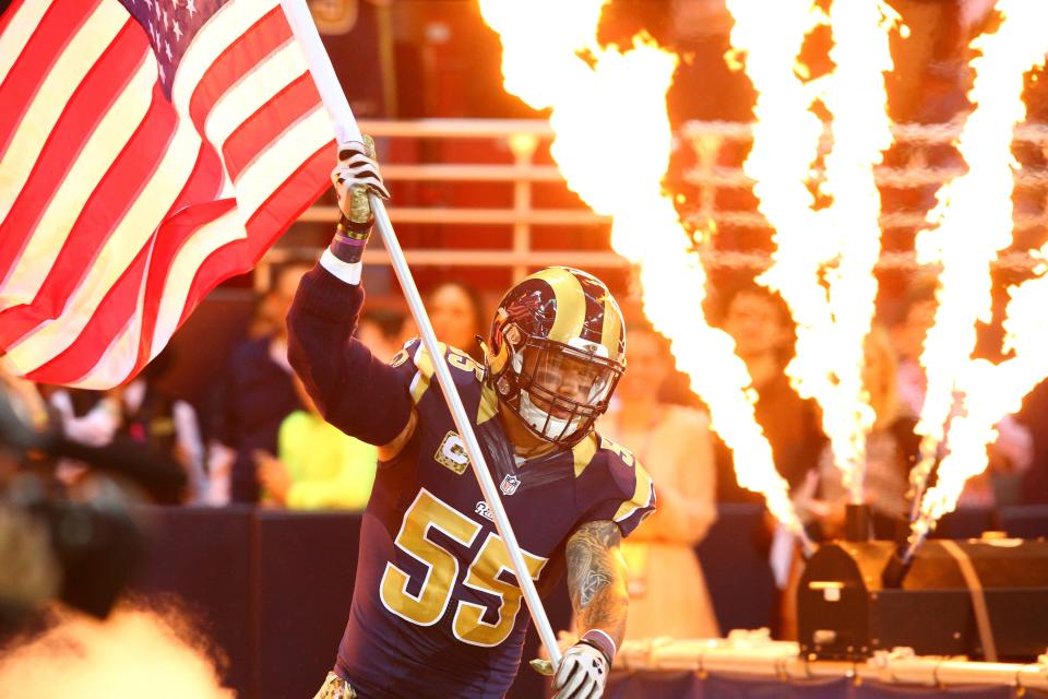 Nov 15, 2015; St. Louis, MO, USA; St. Louis Rams middle linebacker James Laurinaitis (55) is introduced to the crowd prior to the start of a game between the St. Louis Rams and the Chicago Bears at the Edward Jones Dome. Mandatory Credit: Billy Hurst-USA TODAY Sports