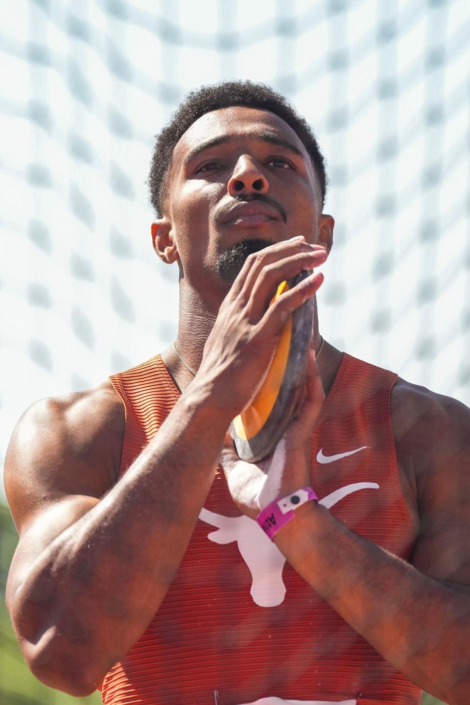 Senior Leo Neugebauer competes in the discus during his win in the decathlon at the Texas Relays on Thursday.