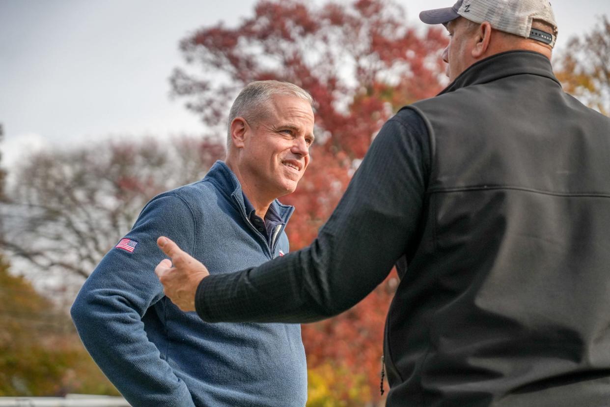 Candidate Gerry Leonard visits Barrington Middle School polling place.