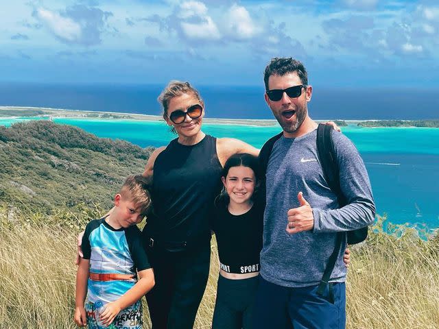<p>Tess Sanchez Instagram</p> Tess Sanchez and Matthew Greenfield with their kids, Ozzie and Lilly in 2021.