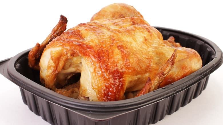 Rotisserie chicken in plastic container