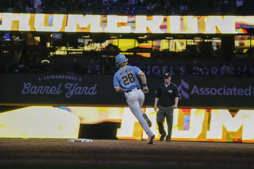 Milwaukee Brewers' Joey Wiemer rounds the bases after hitting a two-run home run during the seventh inning of a baseball game against the Baltimore Orioles Wednesday, June 7, 2023, in Milwaukee. (AP Photo/Morry Gash)