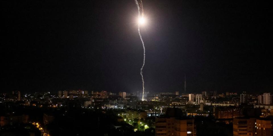 Explosion of a missile is seen in the night sky over the city during a Russian missile strike, amid Russia's attack on Ukraine, in Kyiv, Ukraine May 16, 2023