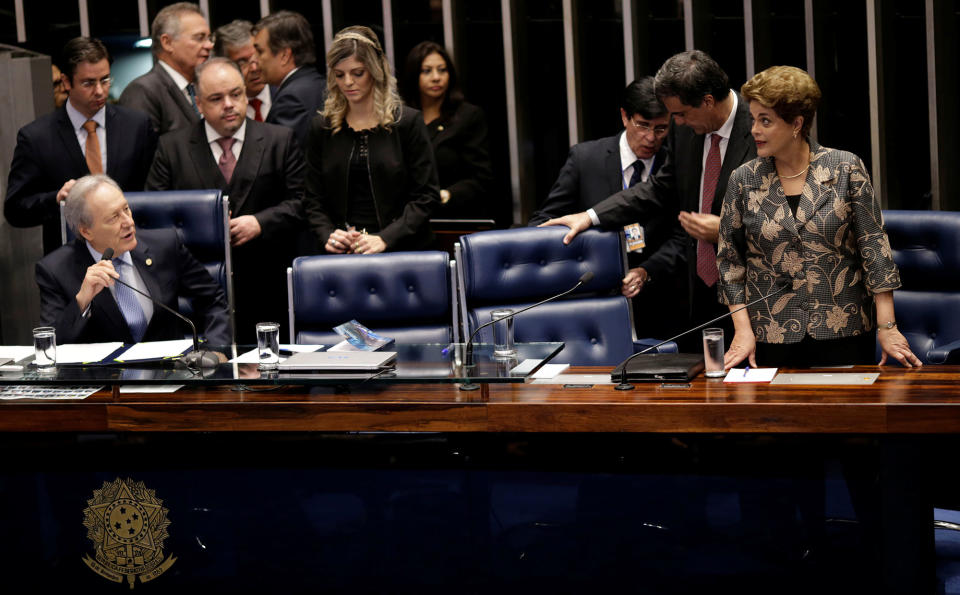 Brazil’s suspended President Rousseff listens to Lewandowski, president of Brazil’s Supreme Court, during the final session of debate and voting on Rousseff’s impeachment trial in Brasilia