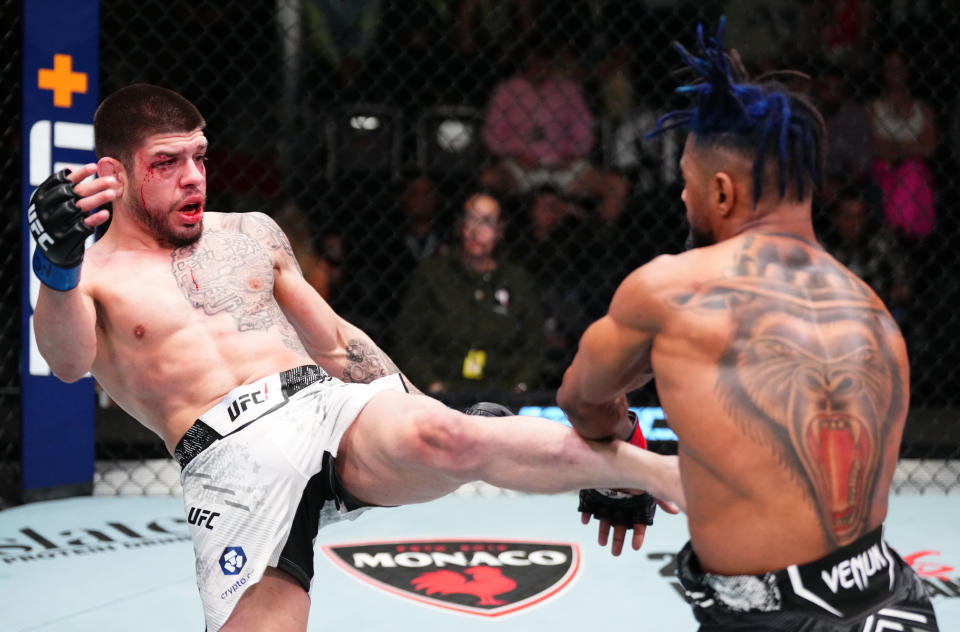 LAS VEGAS, NEVADA – APRIL 06: (L-R) Chepe Mariscal kicks Morgan Charriere of France in a featherweight fight during the UFC Fight Night event at UFC APEX on April 06, 2024 in Las Vegas, Nevada. (Photo by Jeff Bottari/Zuffa LLC via Getty Images)