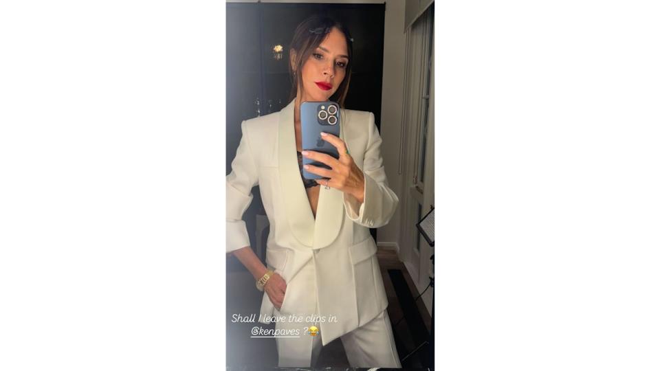 victoria beckham wearing cream suit 