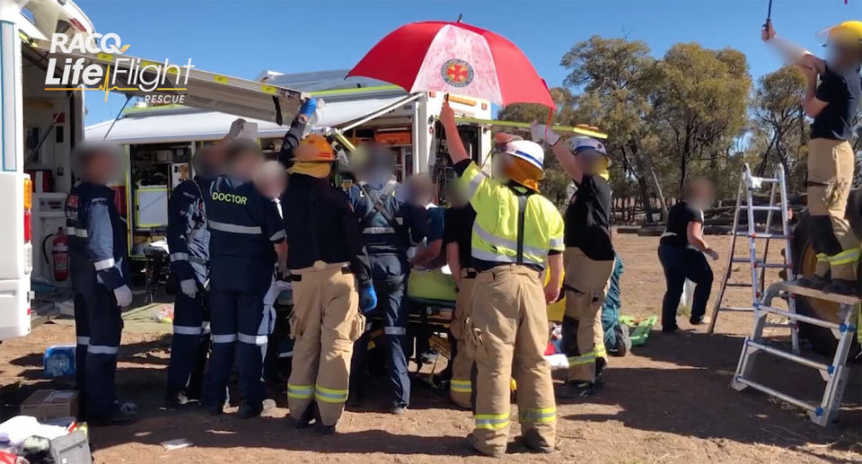 LifeFlight's aeromedical teams, QAS paramedics and local doctors amputate a teenager’s leg while he remained trapped in farming machinery. Source: RACQ LifeFlight Rescue