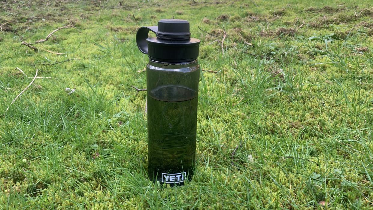  Yeti water bottle in the grass. 