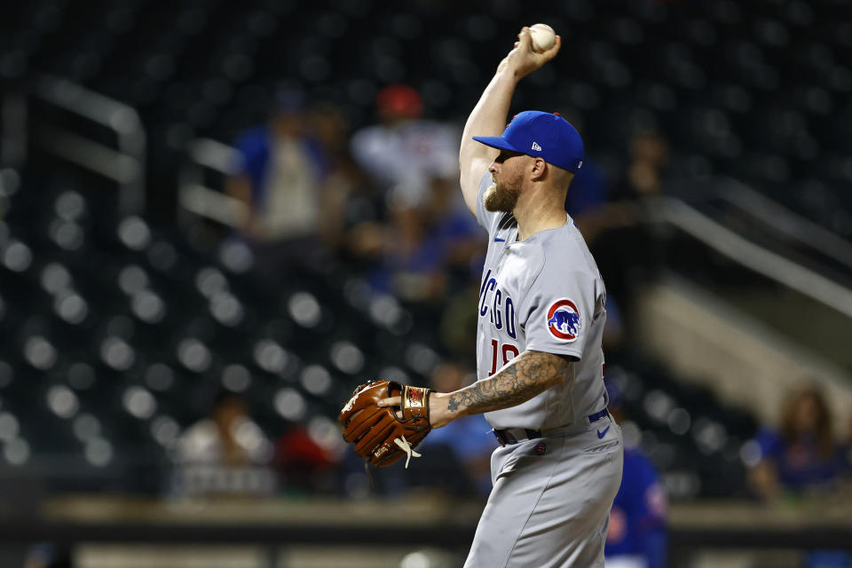 Chicago Cubs catcher Tucker Barnhart (18) pitches against the New York Mets during the eighth inning of a baseball game, Monday, Aug. 7, 2023, in New York. The Mets defeated the Cubs 11-2. (AP Photo/Rich Schultz)