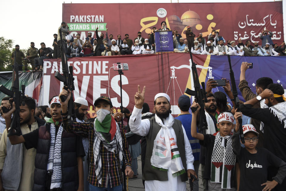 Supporters of a religious party Jamat-e-Islami hold toy guns and take part in a rally against the Israeli airstrikes on Gaza and to show solidarity with Palestinian people, in Islamabad, Pakistan, Sunday, Oct.29, 2023. Thousands of supporters of Pakistan's main politico-religious party rallied in capital Islamabad Sunday against Israel's bombing of Palestinians in Gaza and chanting anti-American slogans, accusing the U.S. of "backing the aggressor." (AP Photo/W.K. Yousafzai)