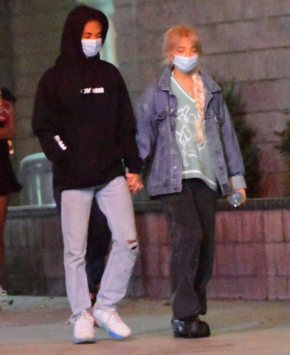 <p>Jaden Smith holds hands with Sab Zada after leaving the movies in L.A. on Sunday.</p>