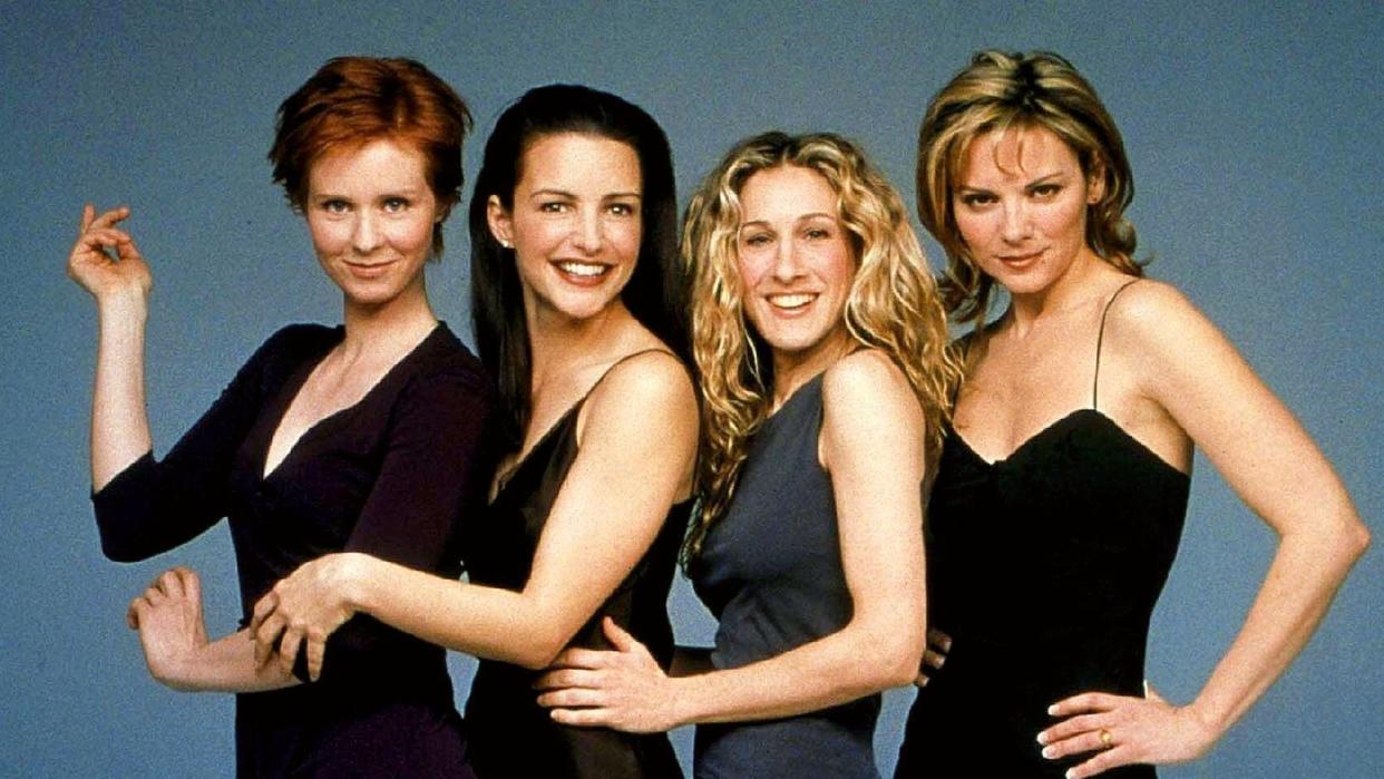  (left to right) Cynthia Nixon, Kristen Davis, Sarah Jessica Parker and Kim Cattrall in a promo photo for Sex and the City. 