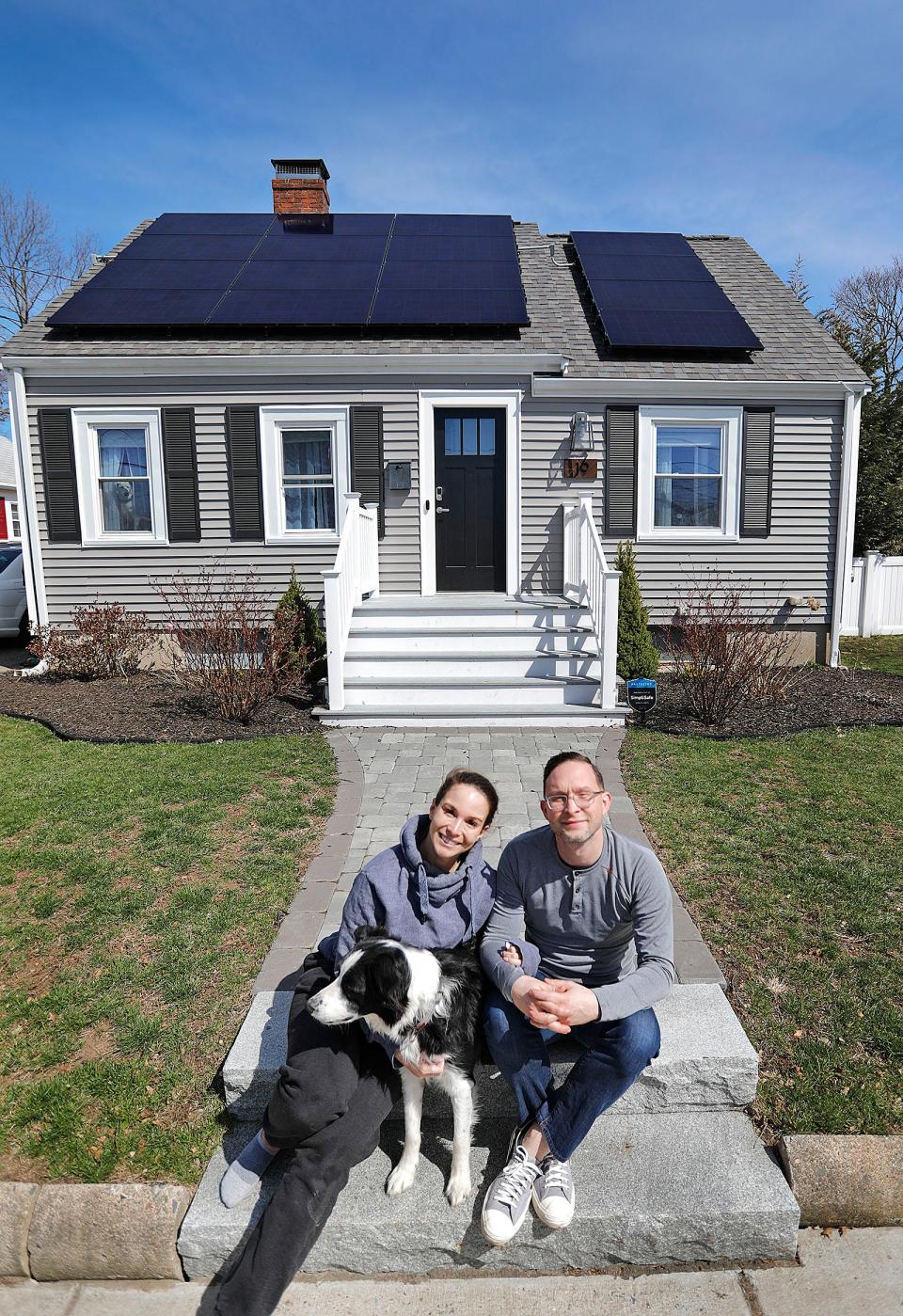 Ariel Campbell, Jack Paleczny and their border collie, Shadow, moved from Boston to a house in Quincy, where the couple hired landscapers to spruce up their property. Tuesday, March 29, 2022.