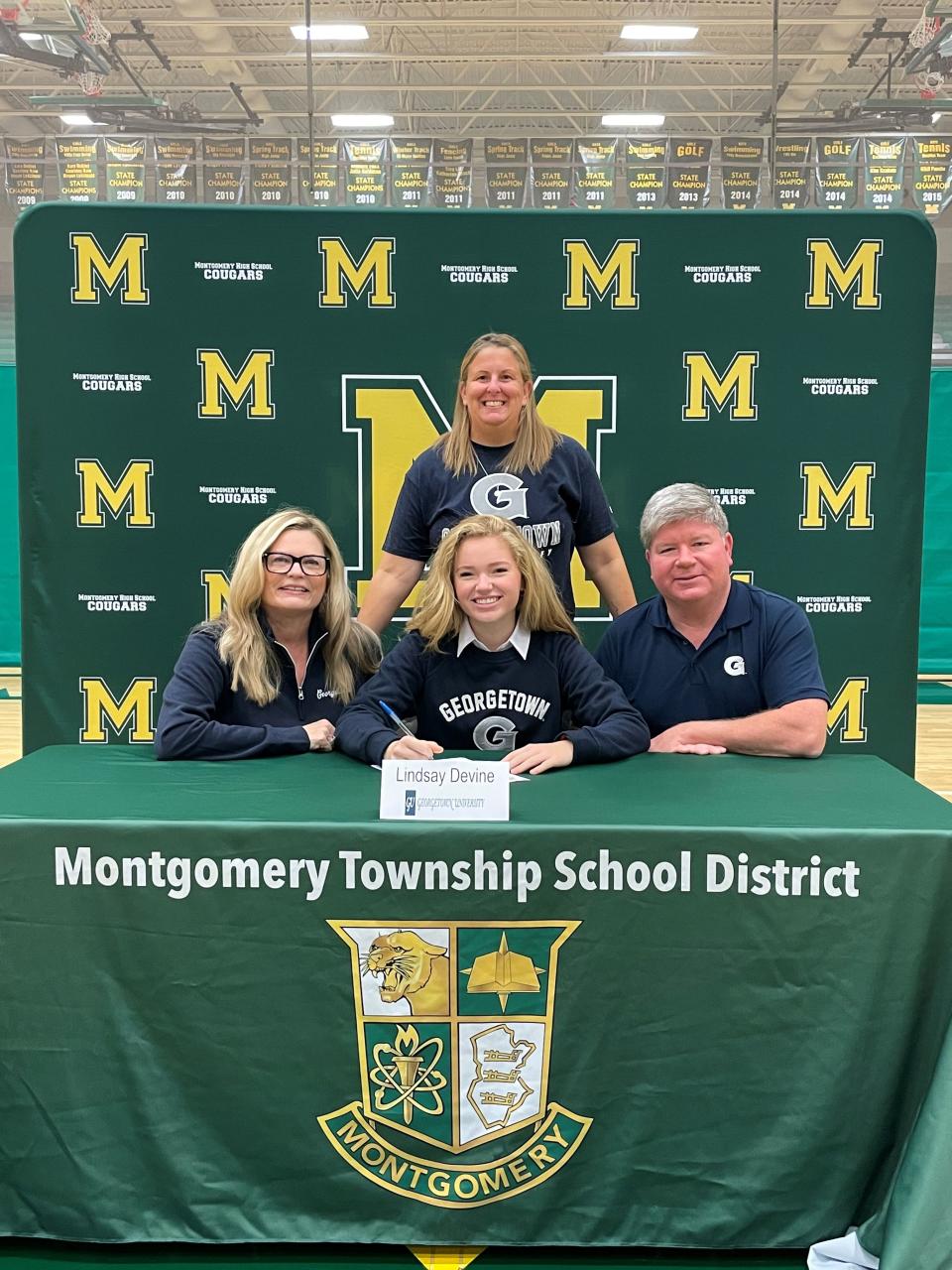 Montgomery's Lindsey Devine signs her National Letter of Intent to play field hockey at Georgetown on Wednesday, Nov. 10, 2021.