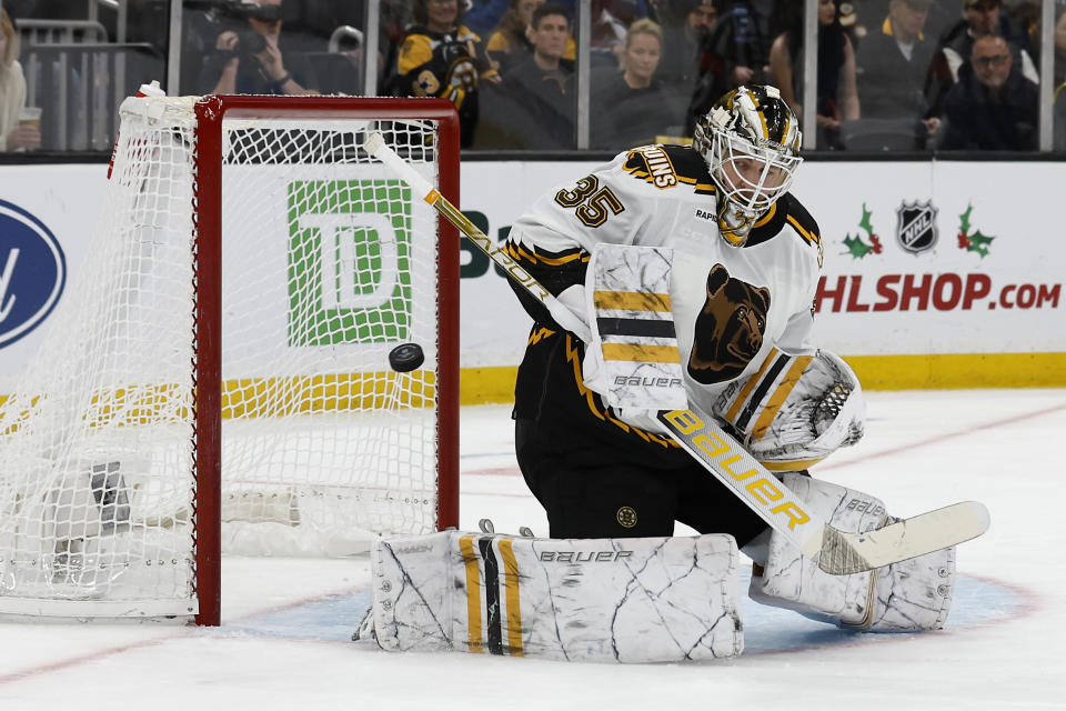 Boston Bruins goaltender Linus Ullmark makes a save against the Colorado Avalanche during the first period of an NHL hockey game Saturday, Dec. 3, 2022, in Boston. (AP Photo/Winslow Townson)