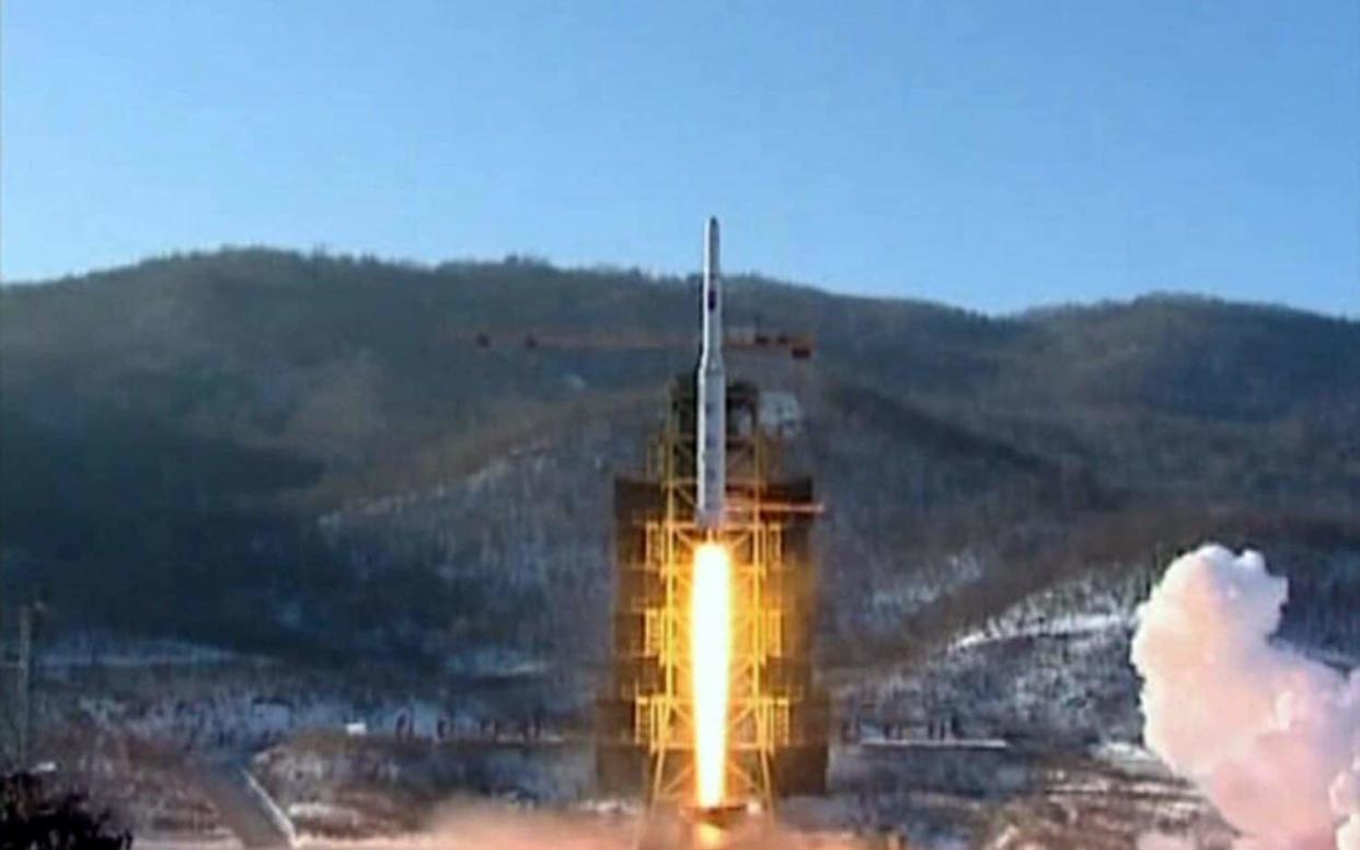 Footage from the KCNA news agency shows the Unha-3 rocket launching at North Korea's West Sea Satellite Launch Site in 2012 - Reuters